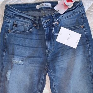 Ripped blue jeans - never worn still had tags